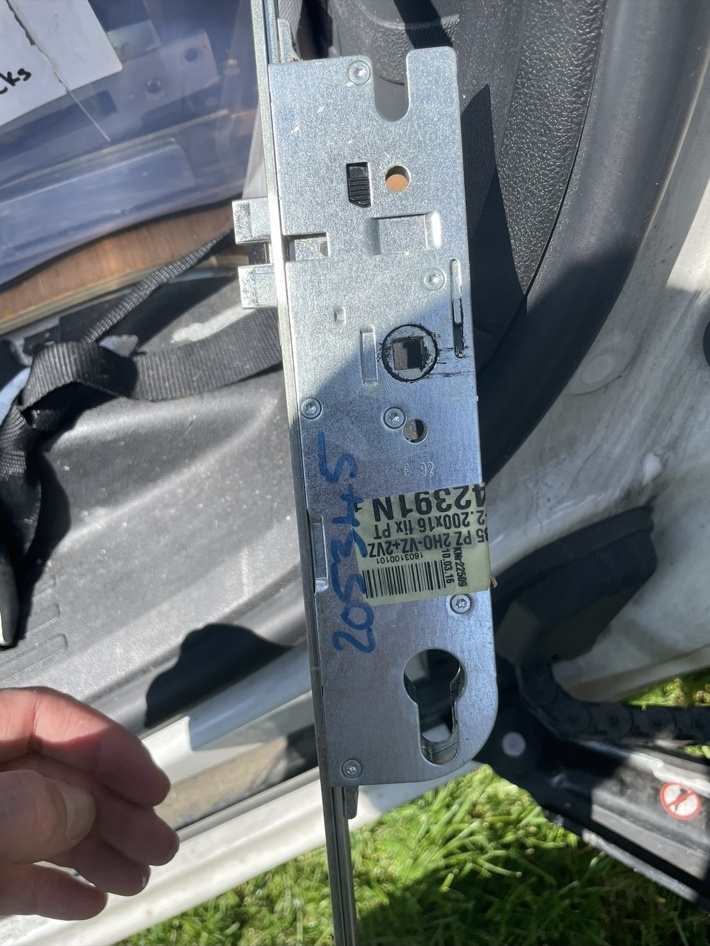 Multipoint lock gearbox photographed outside the door